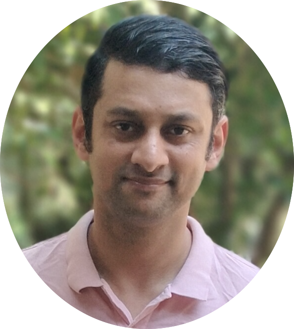 SelfLoversPoint Founder Harshwardhan is standing with a light smile on his face in a calm garden.