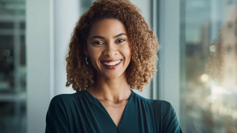 Woman feeling calm and confident after learning to stop people-pleasing while staying kind